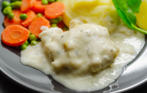 Mornay sauce poured over freshly cooked cod