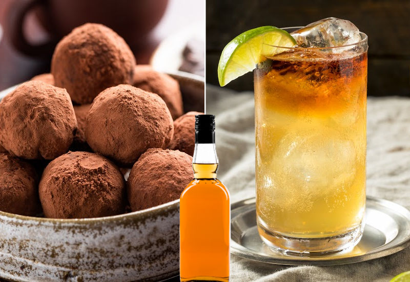 Truffles and a cocktail next to a bottle of rum