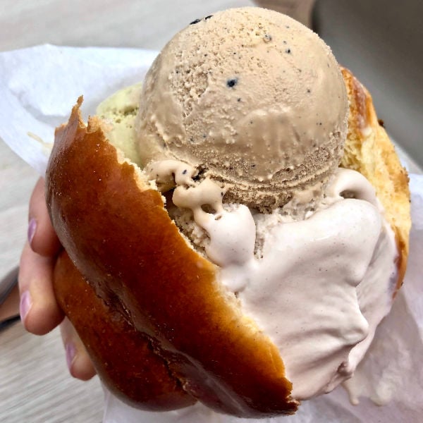 Holding a brioche ice cream sandwich