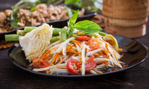 Som tam Thai salad in bowl