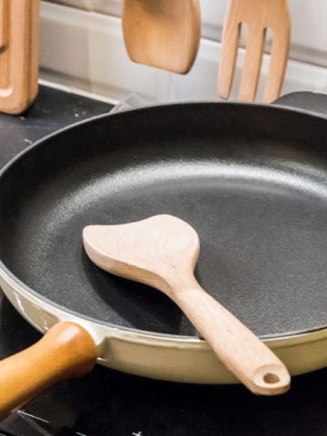 cast iron skillet on electric stove
