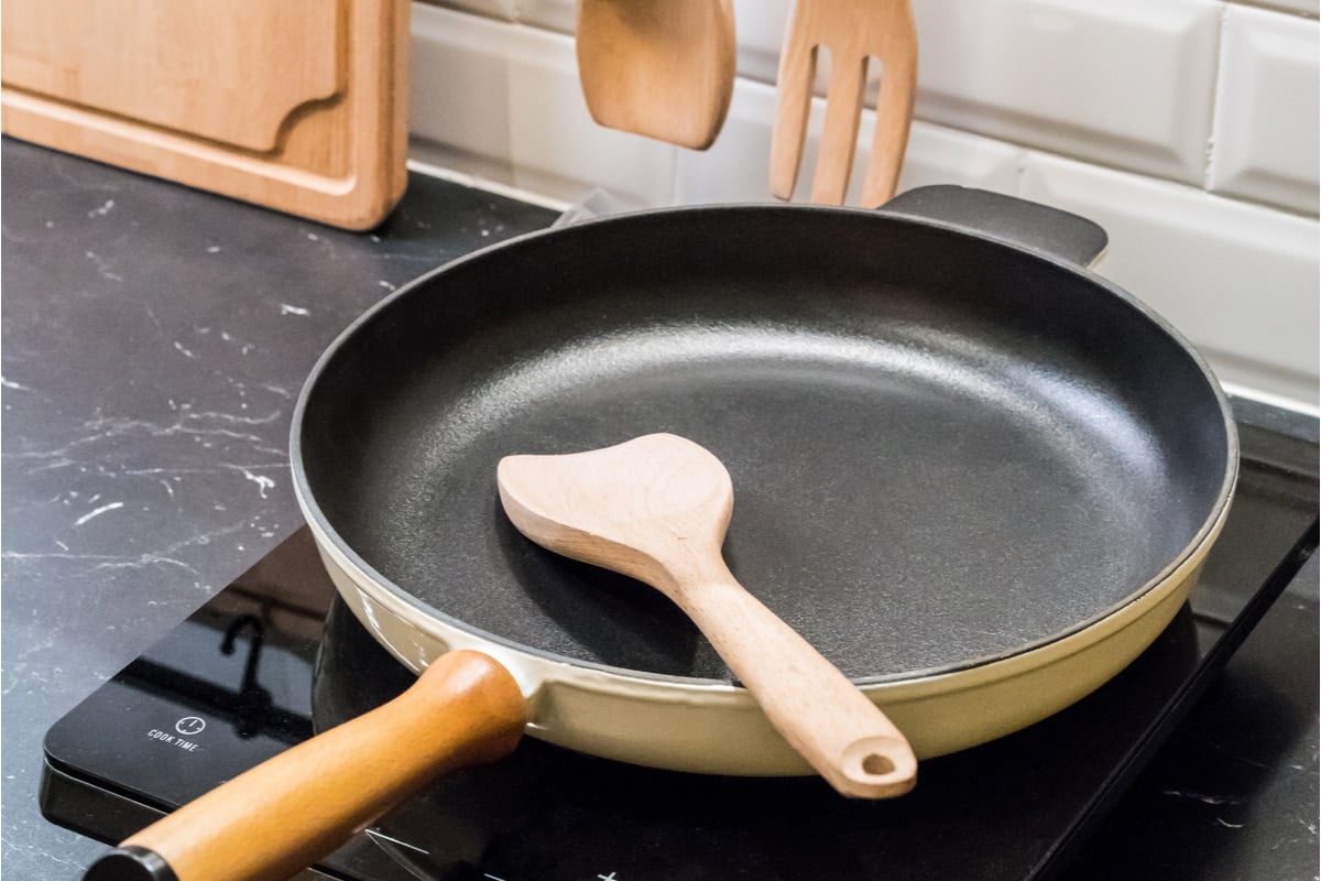 cast iron skillet on electric stove