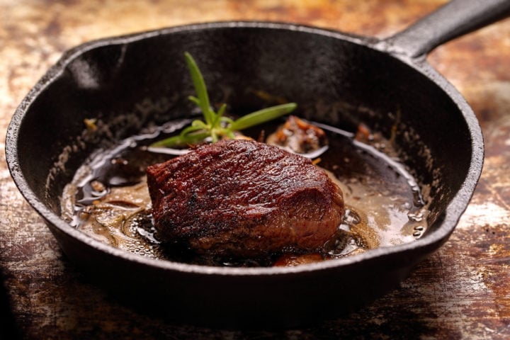 Beef steak on cast iron skillet