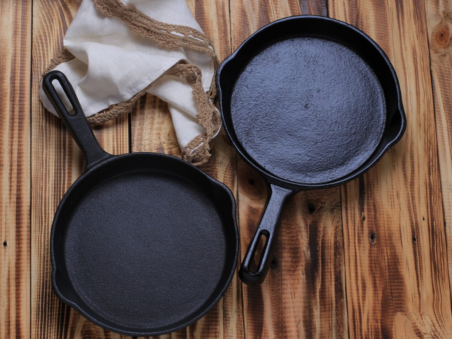 two cast iron skillets