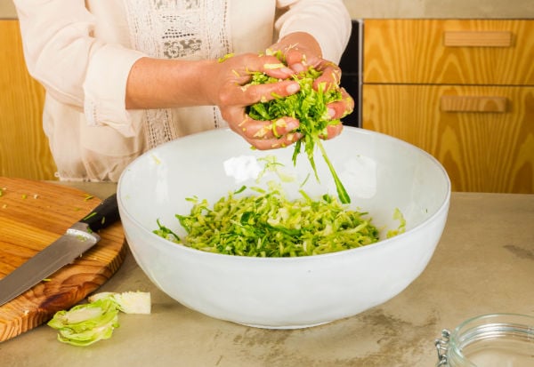 Massaging salt into the cabbage