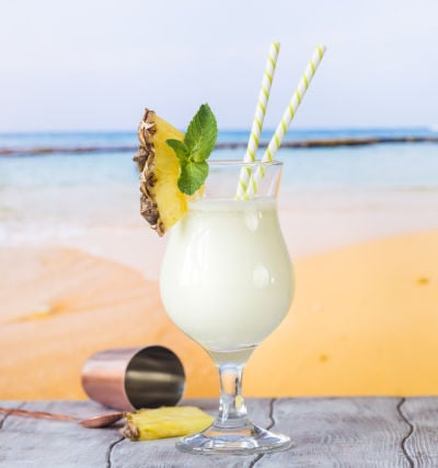 Pina Colada cocktail next to the beach 