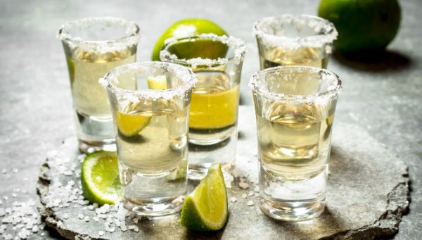 Shots of tequila on a board