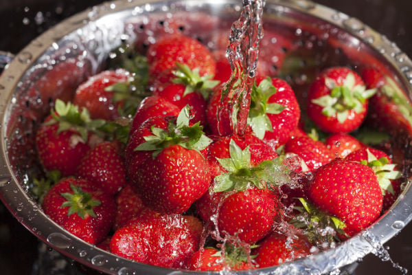 Washing strawberries in water