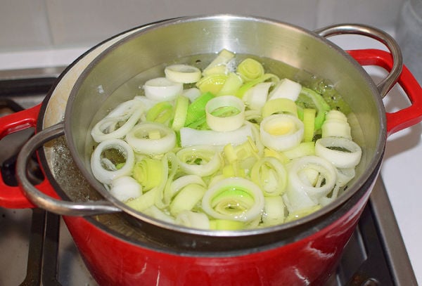 Leeks being blanched in boiling water
