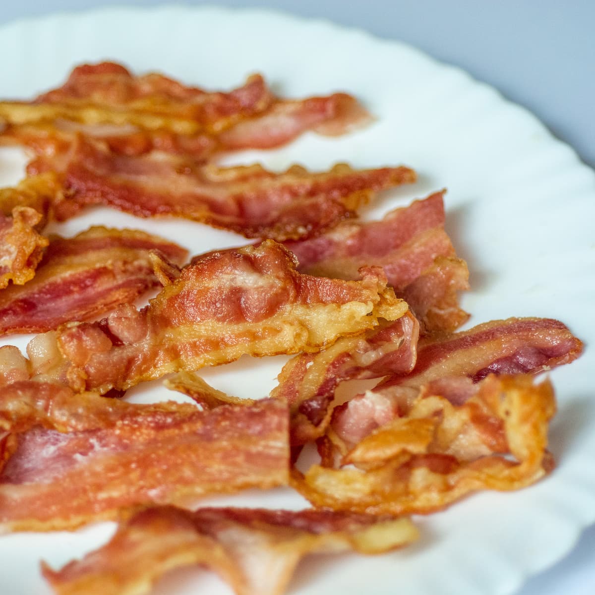 instant pot bacon on a white plate