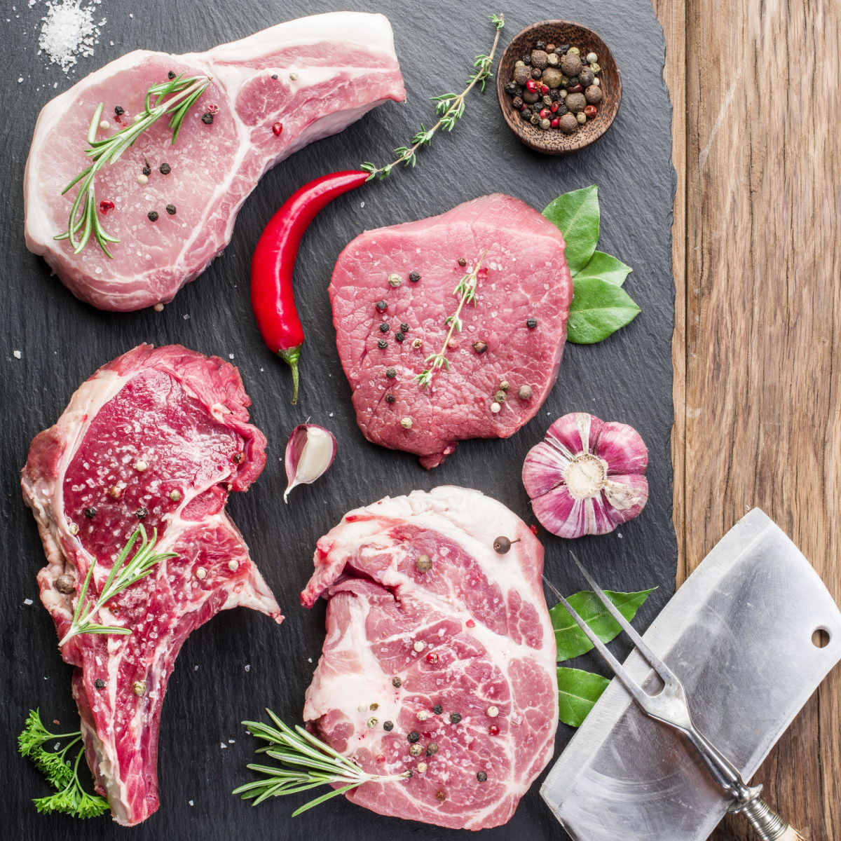 raw pork and beef steaks