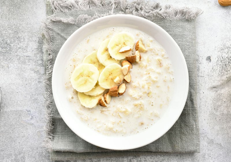 Cooked oatmeal in a white bowl