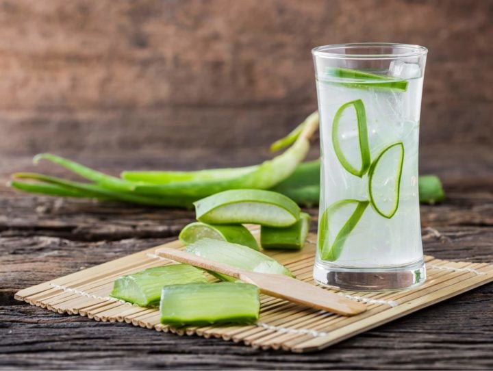 aloe vera juice with aloe vera gel and leaves