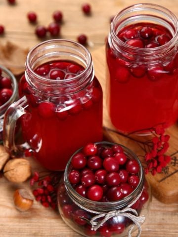 cranberry juice drinks on wooden table