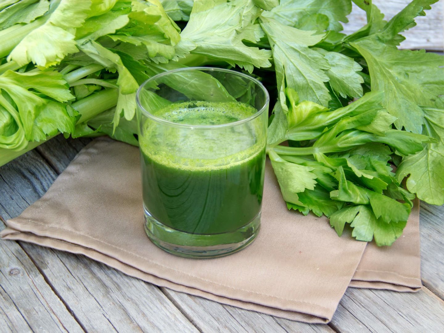 fresh celery juice with celery leaves