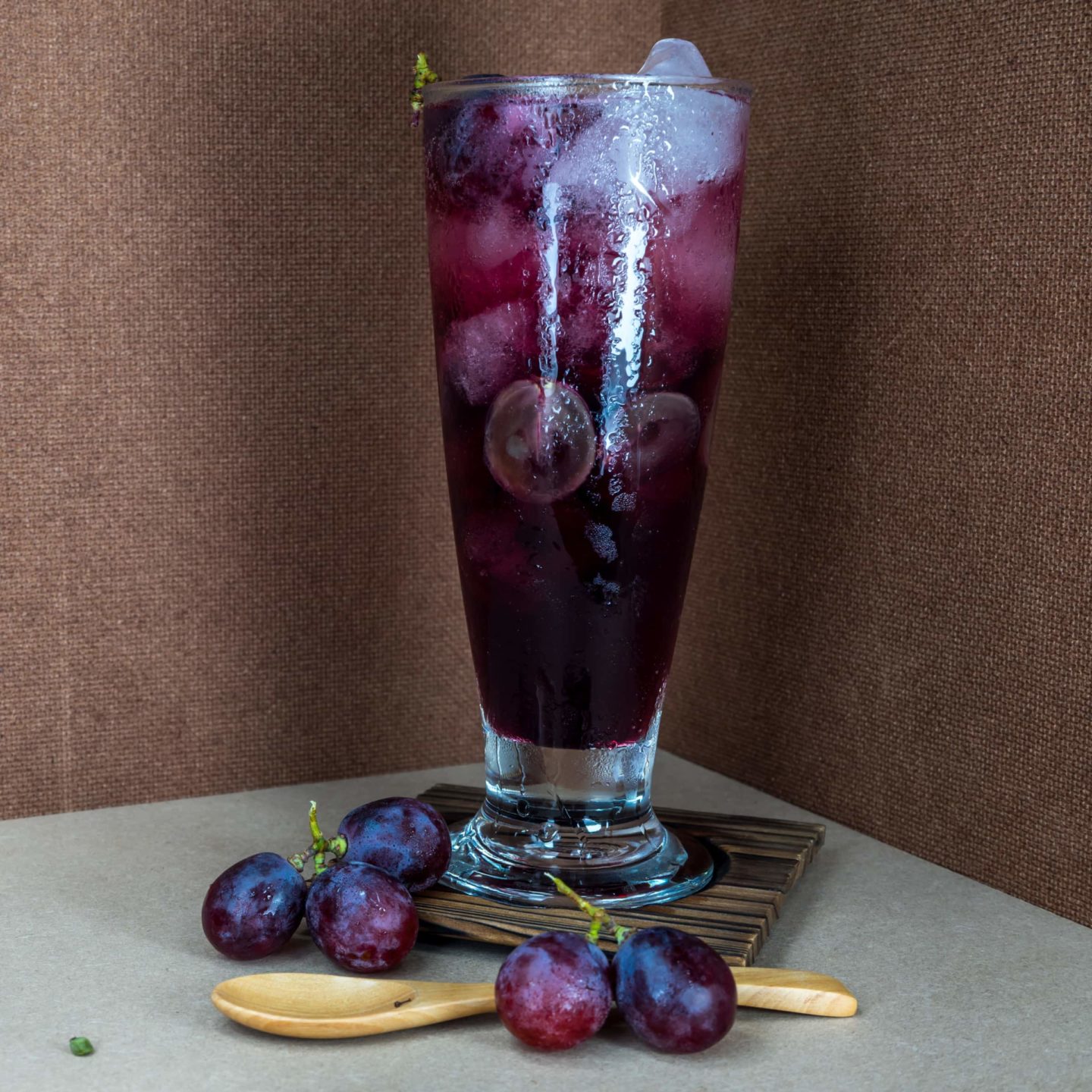Grape Juice With Wooden Spoon