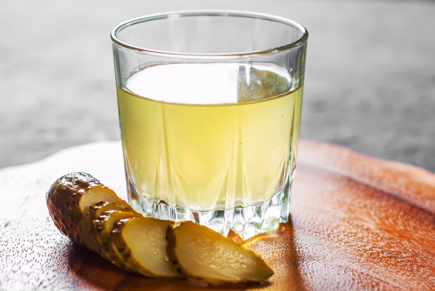pickle juice in a glass