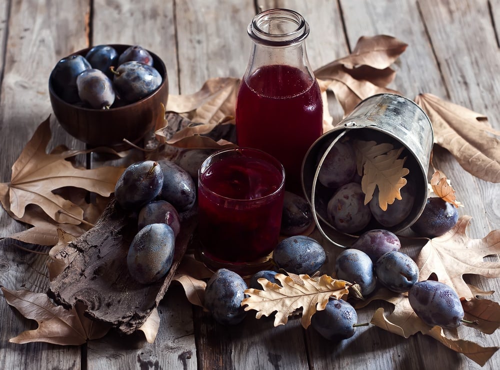 homemade prune juice made from fresh and dried plums