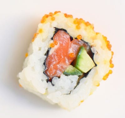 A California roll on a white background