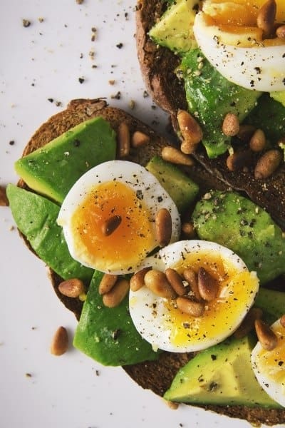 Eggs And Avocado On Toasted Bread