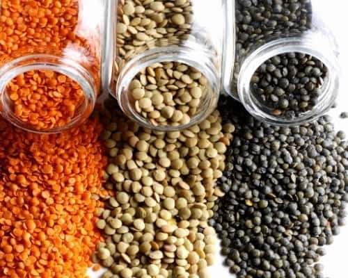 Lentils Spilling From Glass Jars