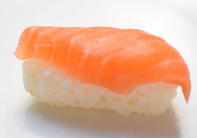 Raw salmon on top of rice