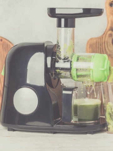Slow Masticating Juicer Producing Healthy Celery Juice Extracting The Pulp