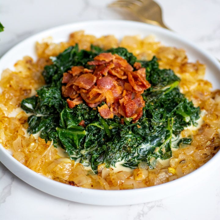 a bowl of sauteed keto kale with bacon and caramelized onions
