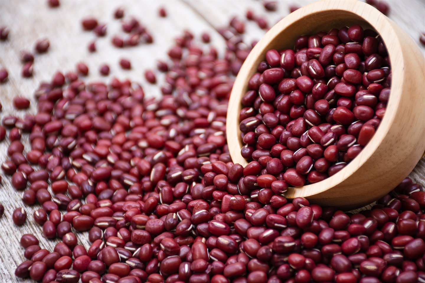 spilled red japanese azuki beans bowl