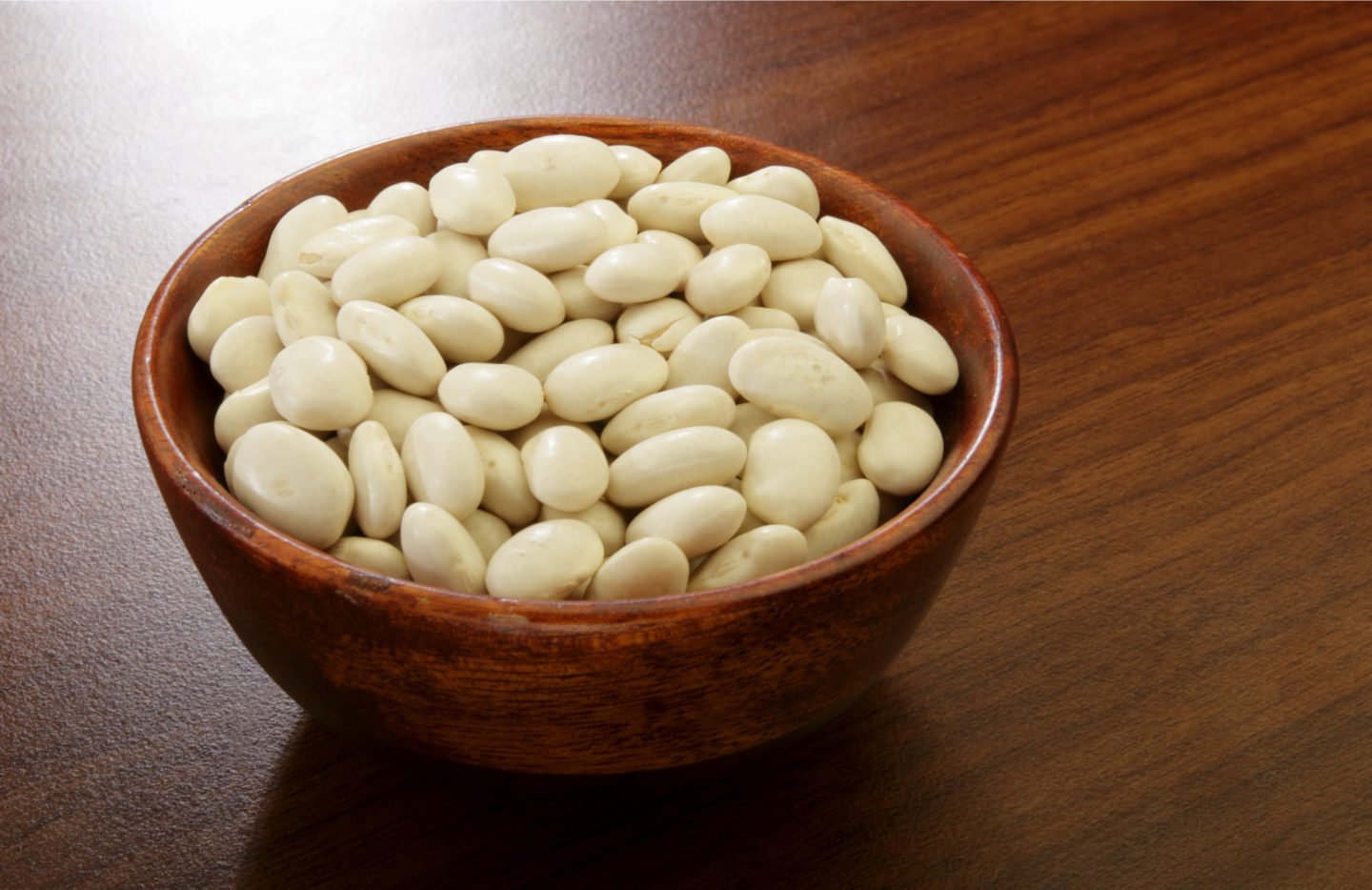 great northern beans in wood bowl