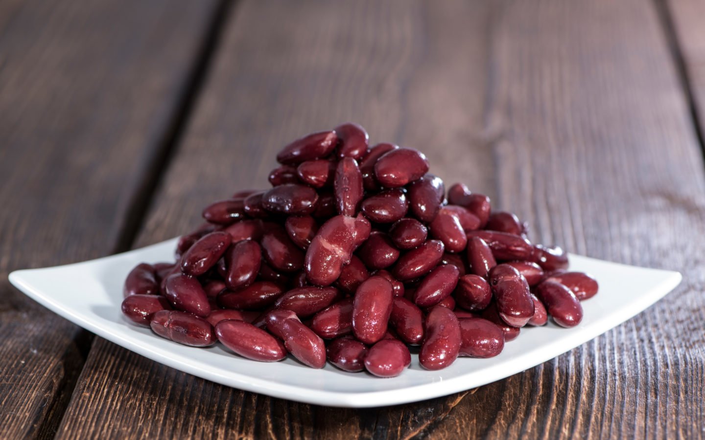 red kidney beans on white plate