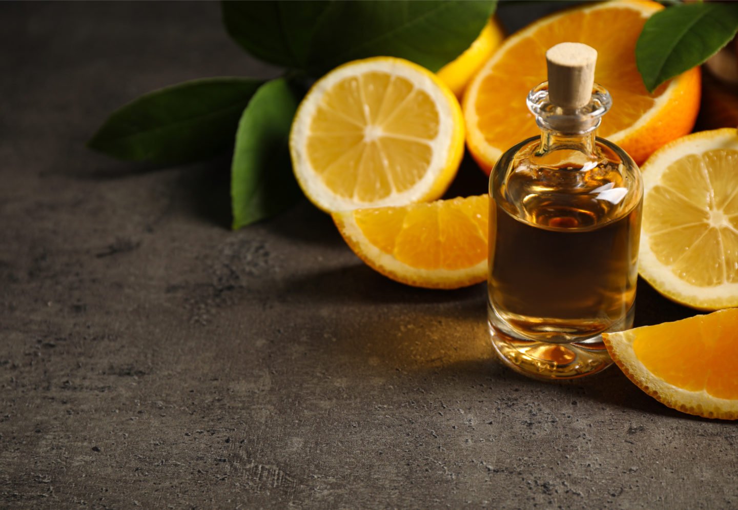 orange extract in glass bottle