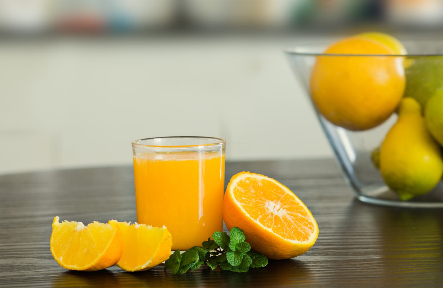 fresh orange juice in small glass
