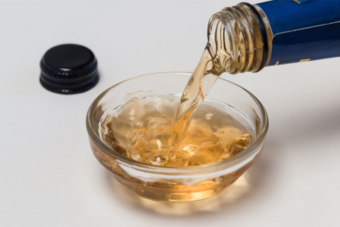 pouring sherry vinegar in bowl
