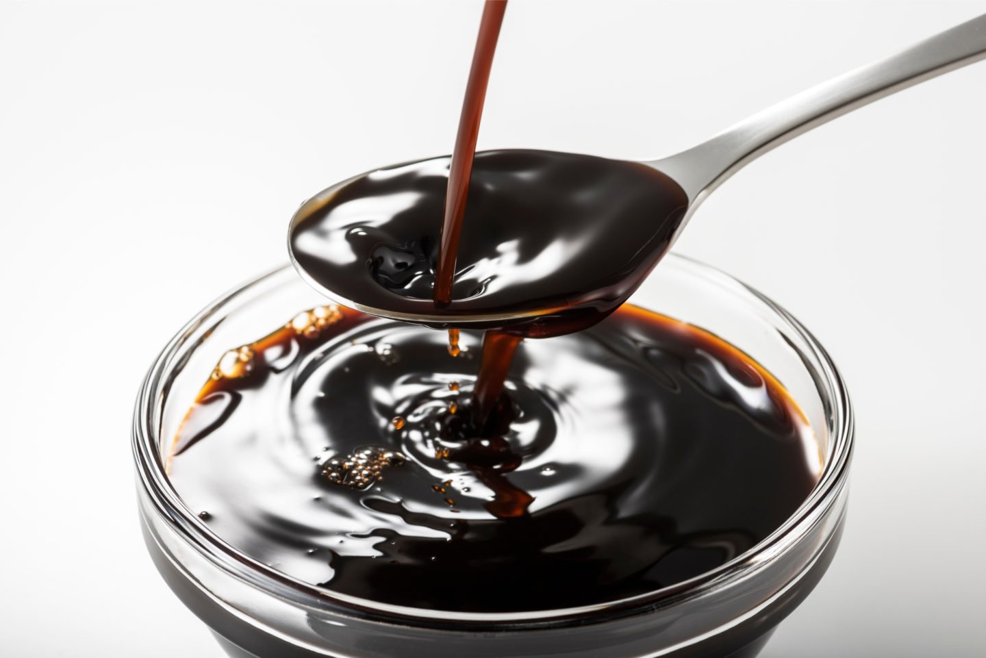 pouring Worcestershire sauce in spoon