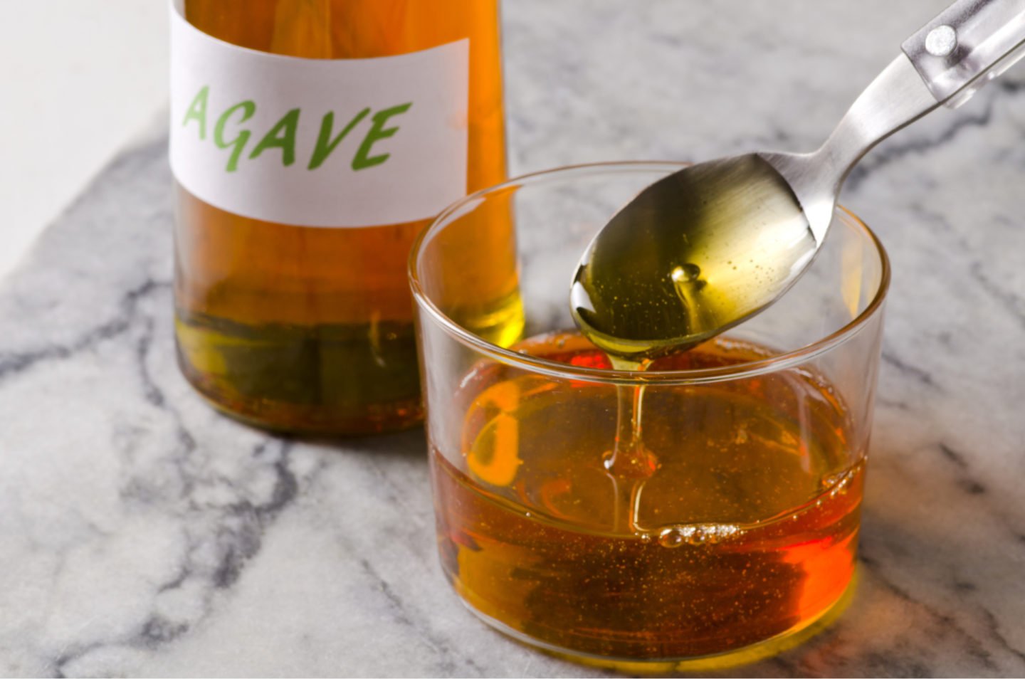 agave syrup in bottle and bowl
