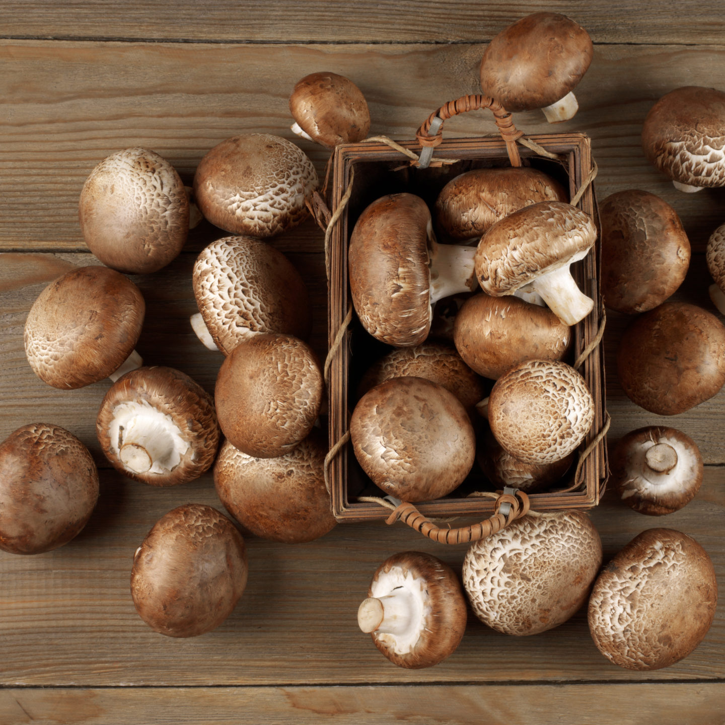 basket of raw cremini mushrooms