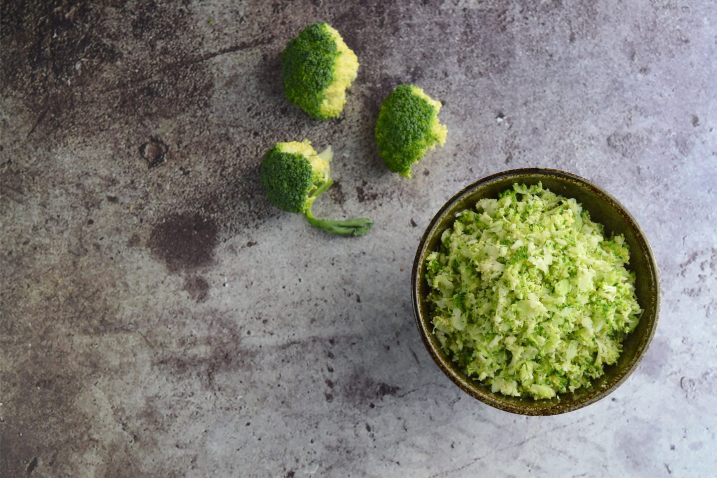 grated riced broccoli in bowl