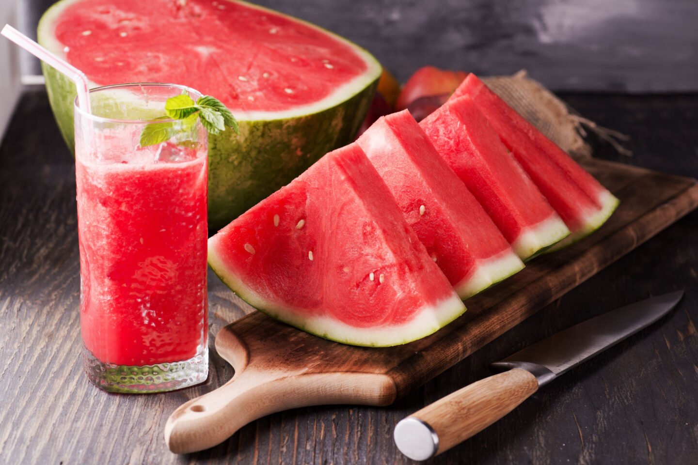 fresh watermelon slices and a glass of juice