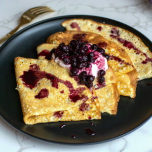 keto crepe with blueberries and cream