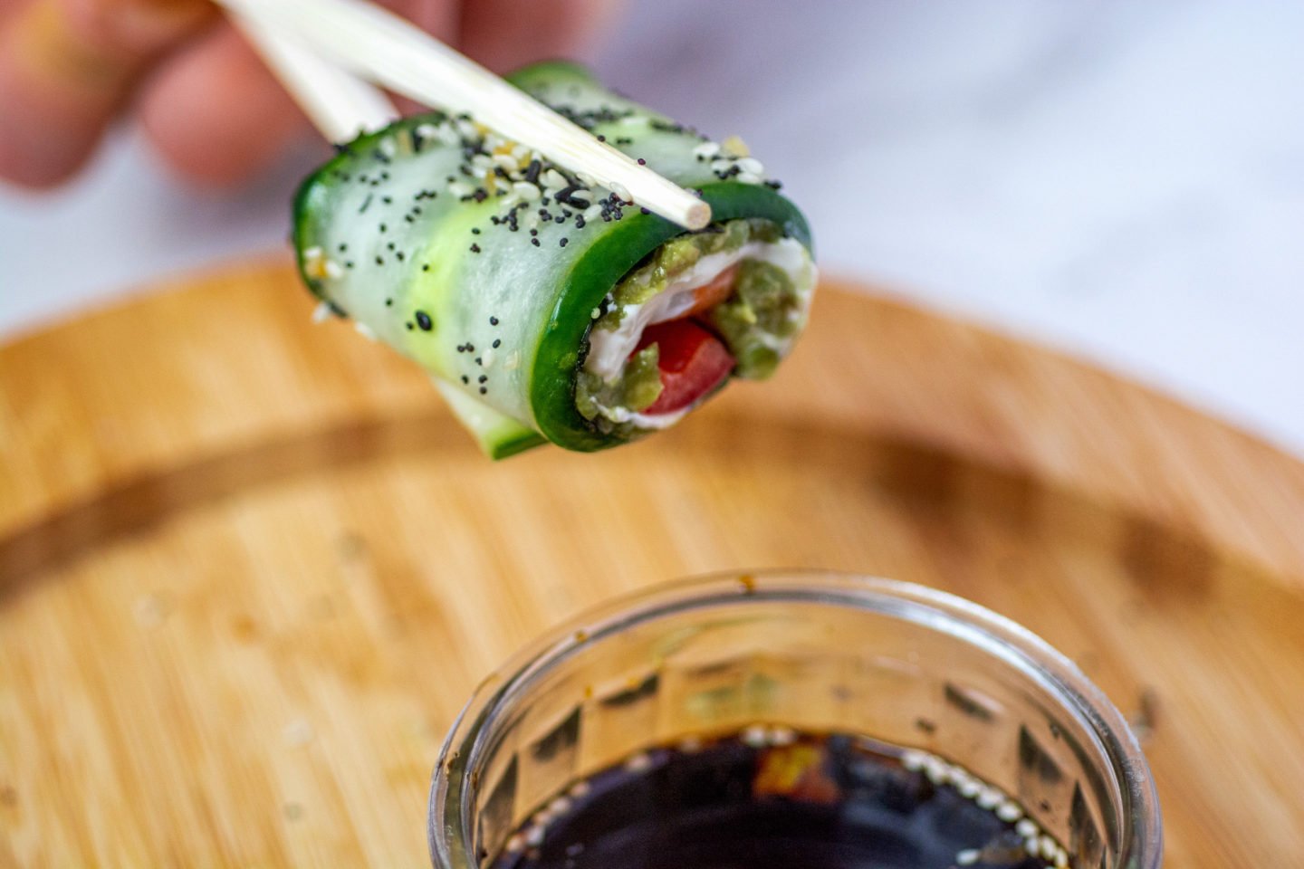 keto cucumber shrimp sushi rolls served with soy sauce
