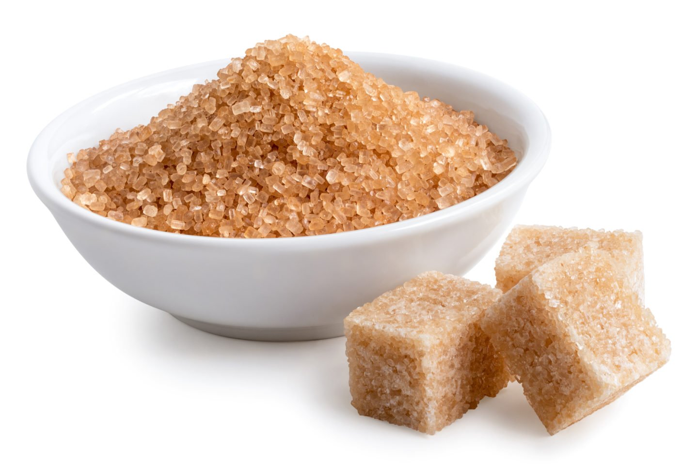light brown granulated sugar in bowl and cubes