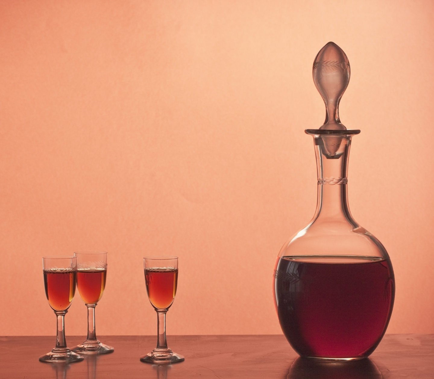 bottle of marsala wine beside glasses