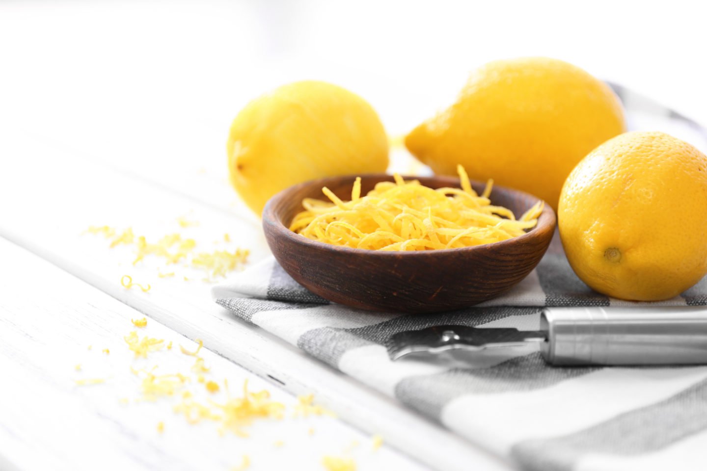 lemon zest in black bowl