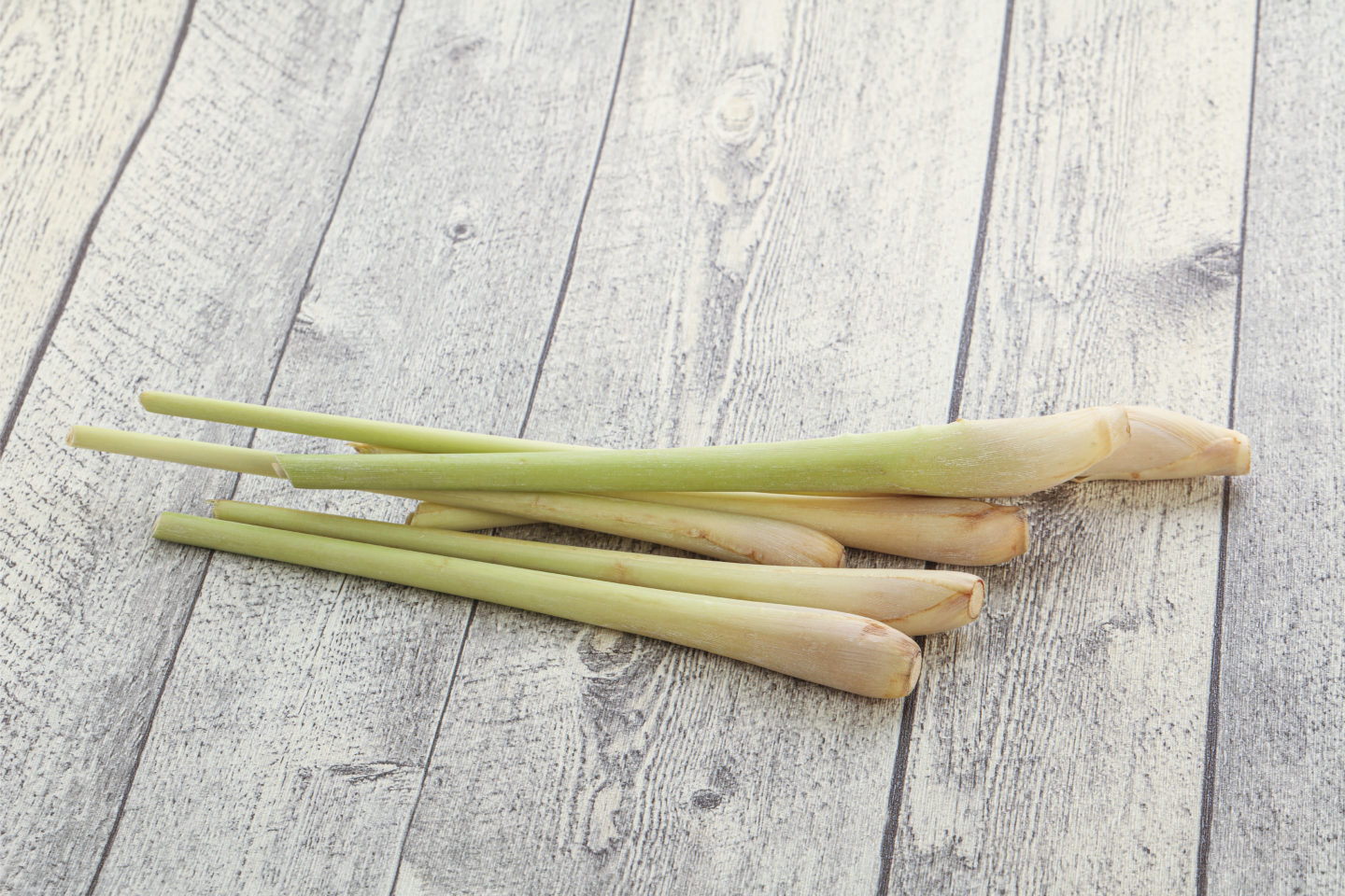 lemon grass on wood surface