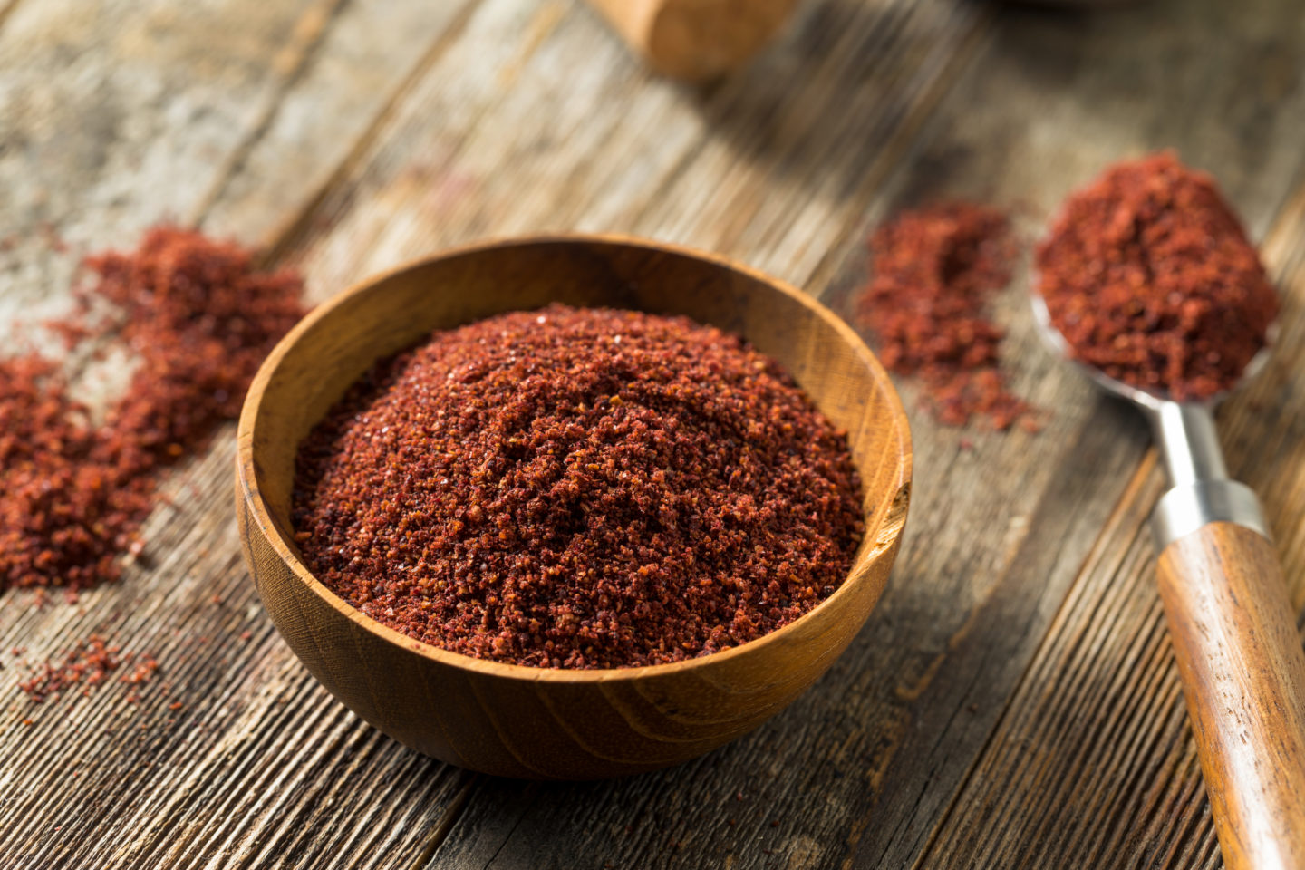 organic red sumac in a bowl