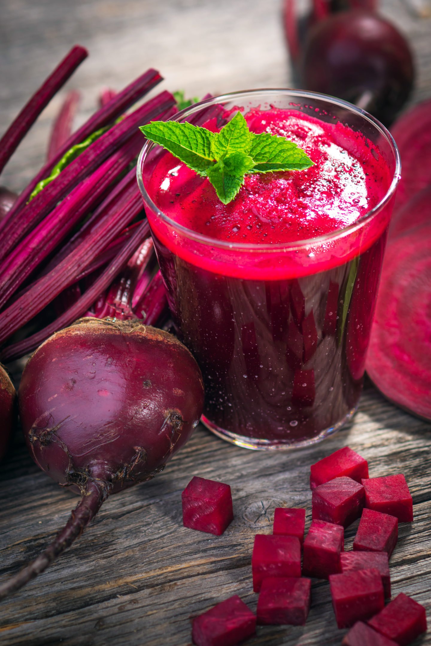 beet juice pictured with fresh beets