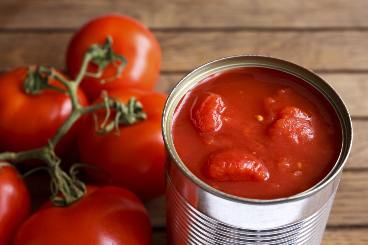 canned tomatoes on table