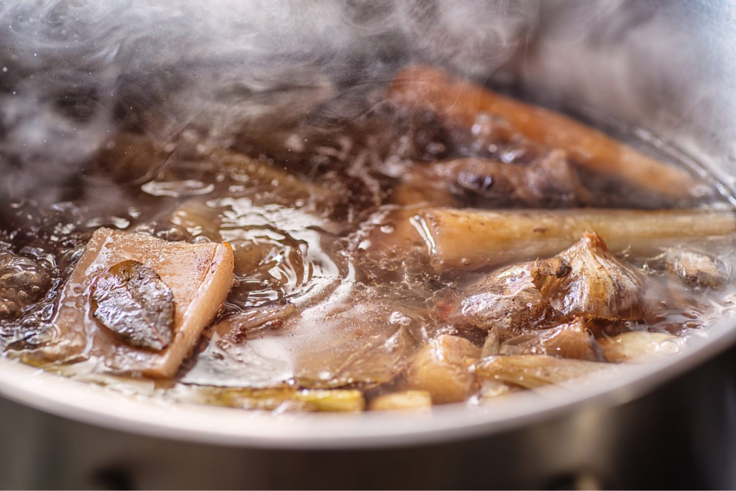 Beef Broth Simmering In Pot