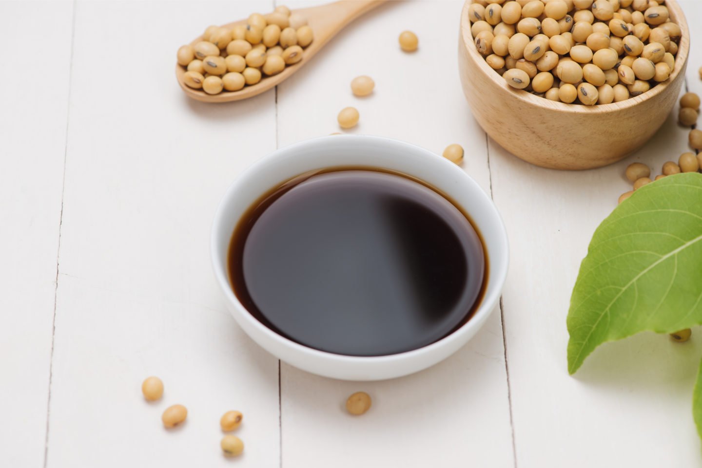 dark soy sauce in white bowl on table